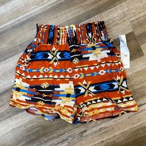 Size Medium multi-colored short never worn